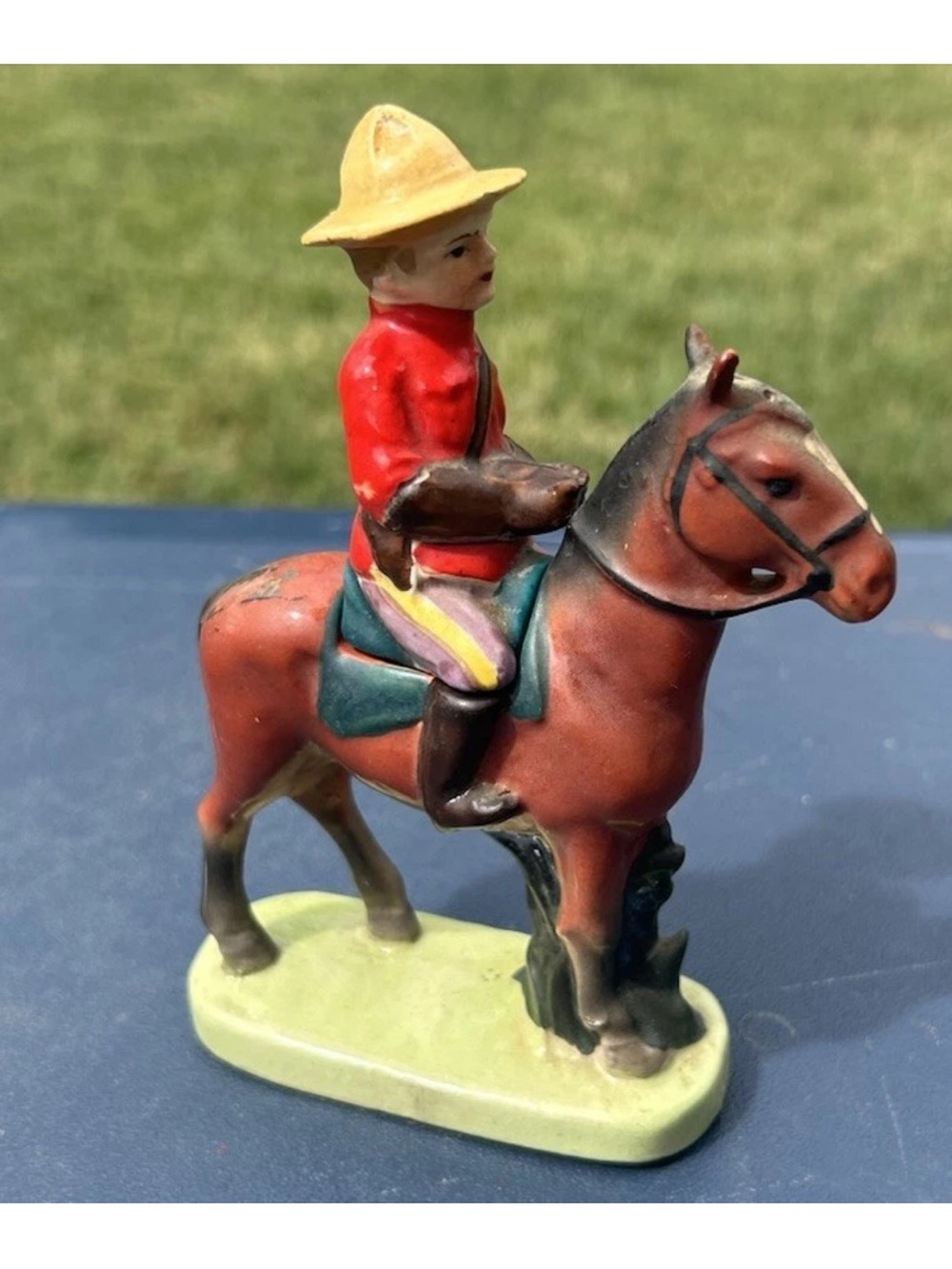 ANTIQUE ROYAL CANADIAN MOUNTIE ON HORSEBACK SALT AND PEPPER SHAKERS